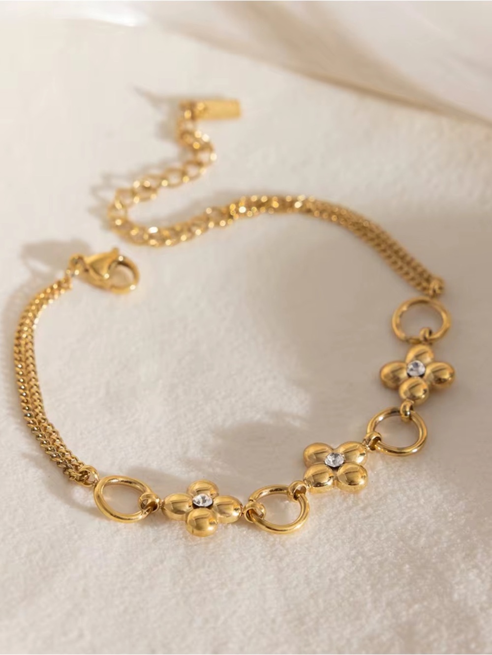 Gold Floral Link Bracelet with Crystal Accents
